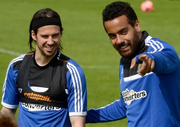 Hull City's George Boyd, left, shares a joke with Tom Huddlestone during training earlier this week.