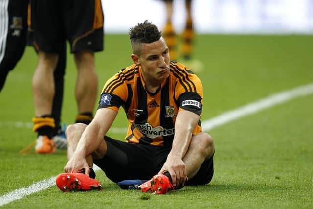 Hull City's Jake Livermore sits dejected after the FA Cup Final. PIC: PA