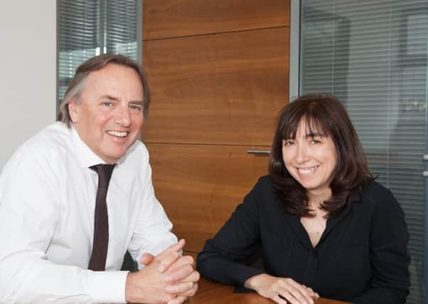 Martyn Harrison, chairman and 
Ann Scott, managing director