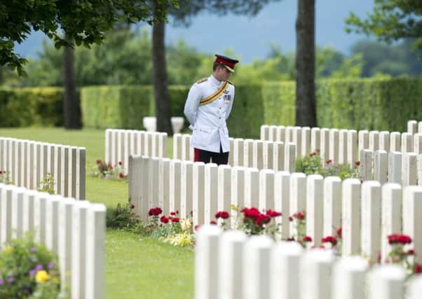 Prince Harry at the cemetery.
