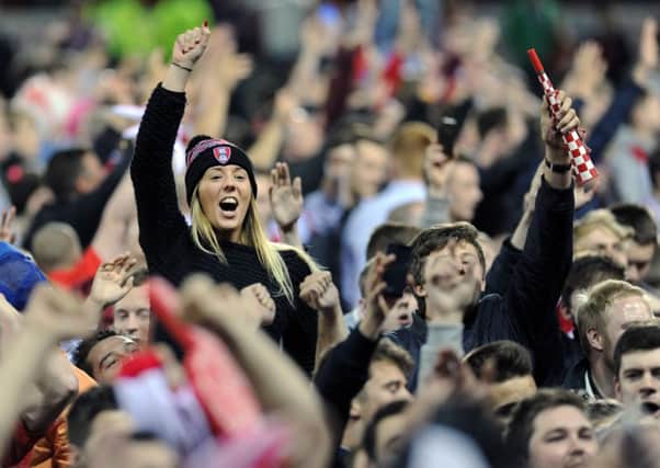 Rotherham United supporters celebrate their League One play-off semi-final victory at New York Stadium (Picture: Jonathan Gawthorpe).