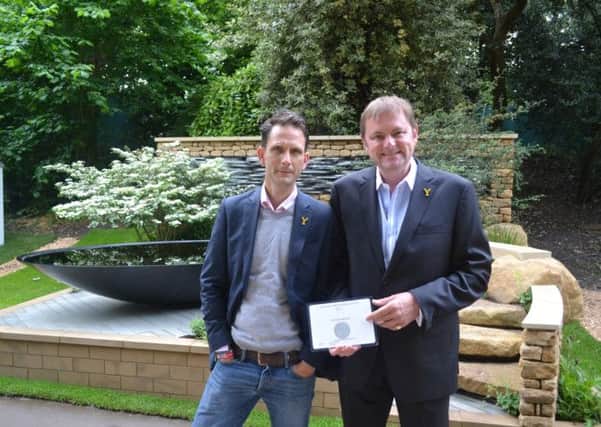 Alistair Baldwin and Gary Verity in front of the silver medal-winning Tour de Yorkshire garden at the Chelsea Flower Show.