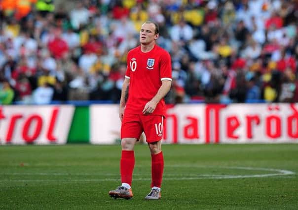 England's Wayne Rooney stands dejected during the Round of 16 match at the Free State Stadium, Bloemfontein, South Africa.