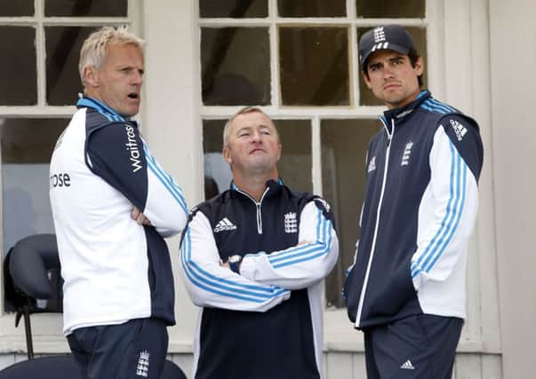 England head coach Peter Moores (left), assistant coach Paul Farbrace (centre) and England captain Alastair Cook.