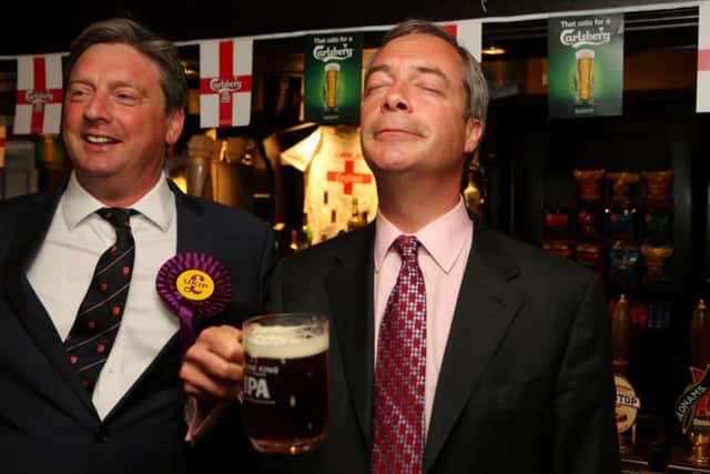 Ukip party leader Nigel Farage enjoys a pint in the Hoy and Helmet Pub in South Benfleet, Essex