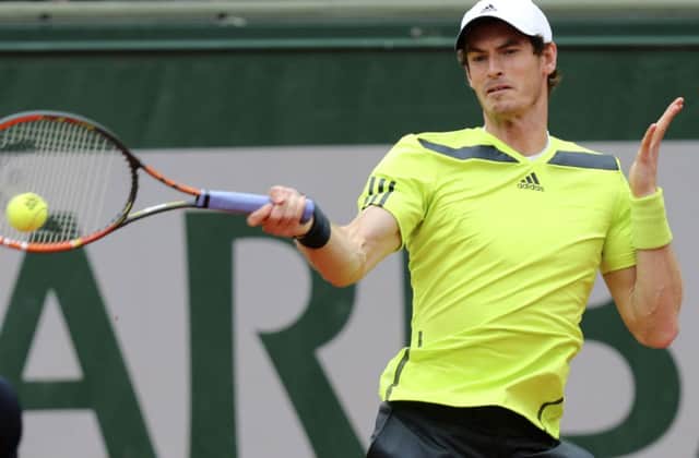 Andy Murray returns the ball to Kazakhstan's Andrey Golubev during their first round match of  the French Open on Tuesday.