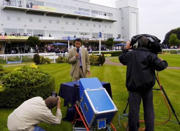 EARLY DAYS: Rishi Persad presents Racing UK's first day of live coverage from Sandown Park back in 2004.