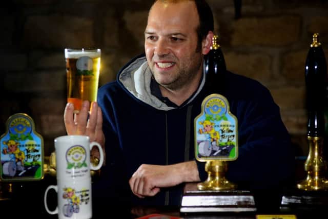 Paul Ward, Head Brewer at Bradfield Brewery, with some Yellow Jersey Ale