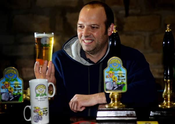 Paul Ward, Head Brewer at Bradfield Brewery, with some Yellow Jersey Ale