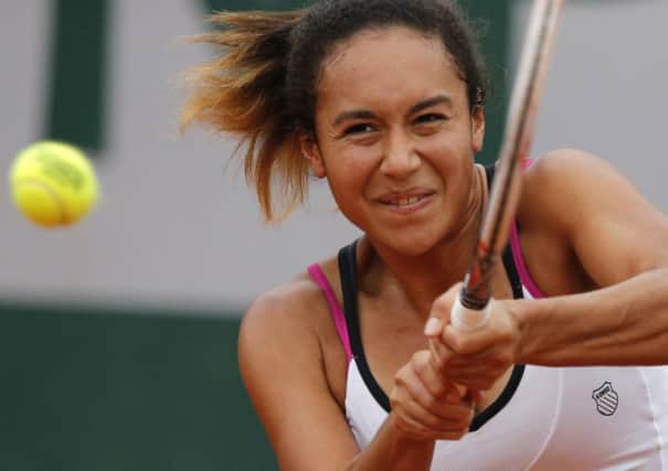 Britain's Heather Watson returns the ball in her second round defeat to Romania's Simona Halep.