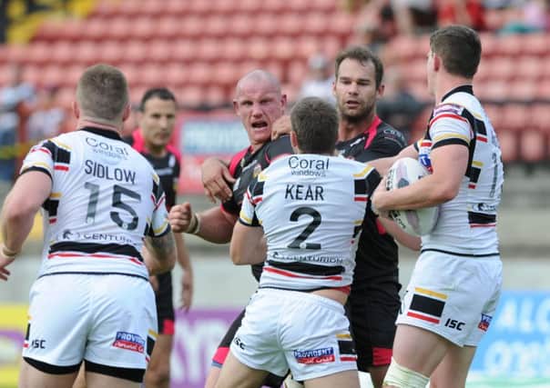 FLASHPOINT: Wakefield's Richard Moore squares up to Bulls Elliot Kear.  Picture by Tony Johnson.
