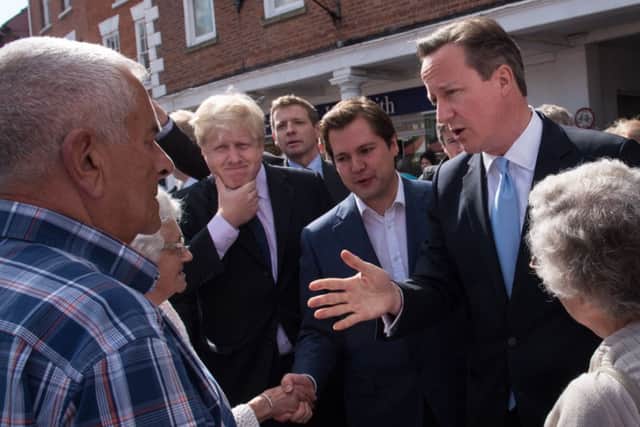 David Cameron and London Mayor Boris Johnson electioneering on the streets of Newark