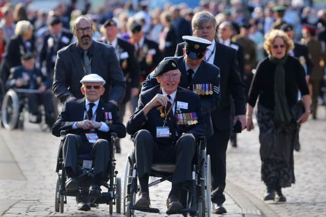 Normandy veterans arrive at Bayeux Cathedral for a commemorative service to mark 70th anniversary of the D-Day landings during World War II