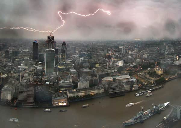 A lightning strike as seen from The View at the Shard in London as a severe weather warning has been issued as storms are expected to hit Britain on Saturday.