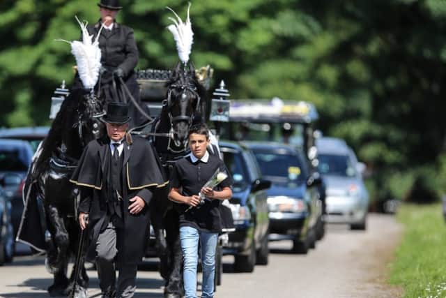 The horse dawn carriage carying Jasmyn Chan towards the chapel at City Road Crematorium, Sheffield.