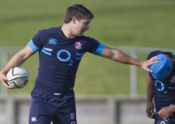 Ben Youngs hands off a team-mate in training yesterday (Picture: Brett Phibbs/AP).