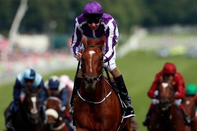 Australia ridden by Joseph O'Brien on their way to victory in the Investec Derby.
