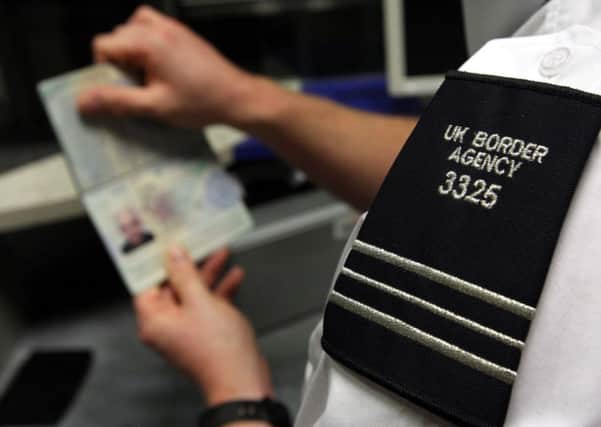 Thousands are still awaiting their holiday passports