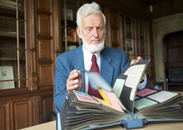 Alan Staniforth looks through the records of the Forty Club. Picture: Tony Bartholomew