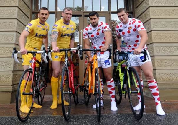 ON YOUR MARKS: Leeds Rhinos players Kevin Sinfield, and Jamie Peacock, along with Catalan Dragons players Mathias Pala and Thibaut Margalet, pose in their special Tour de France kits. Picture: James Hardisty.