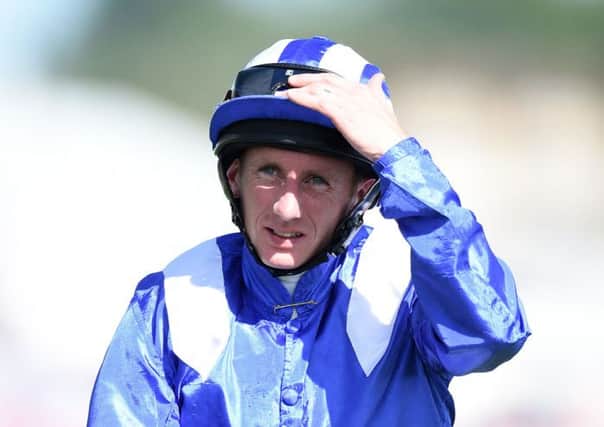 Paul Hanagan after winning the Investec Oaks on Taghrooda (Picture: Adam Davy/PA Wire).