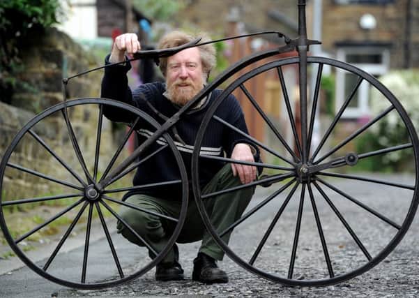 Collector Graham Reed with an 1868 French Velocipede bike. Picture by James Hardisty