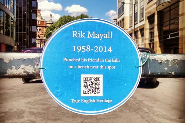A temporary English Heritage style blue plaque in Hammersmith, west London, dedicated to the comic actor Rik Mayall