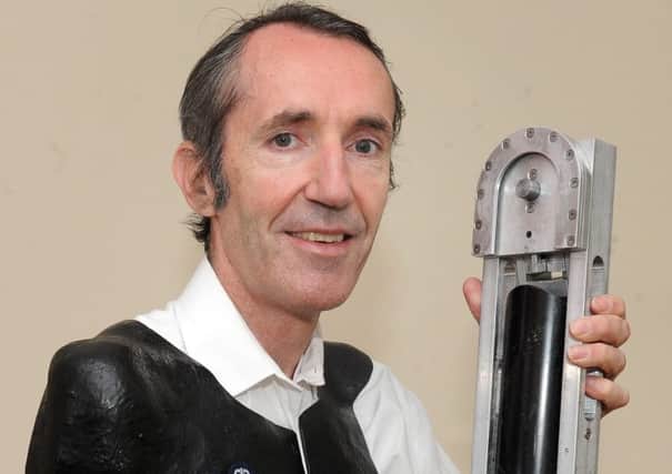 Steven Robinson has invented a prosthetic arm to enable him to learn to fly.