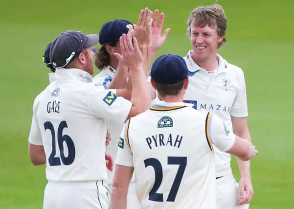 Yorkshire's Steven Patterson (right) is congratulated on the wicket of Notts' Michael Lumb (Picture: Alex Whitehead/SWpix.com)