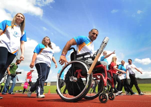 The Queen's Baton Relay arrives at John Charles Centre for Sport, Middleton, Leeds ahead of the Commonwealth Games.