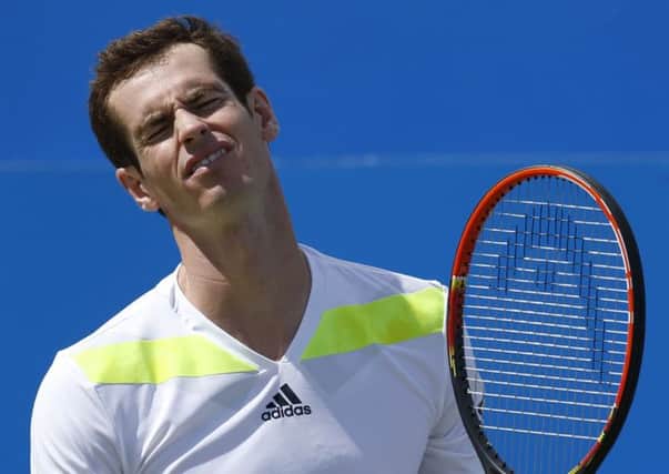 Andy Murray grimaces as a point eludes him at Queens yesterday (Picture: Jonathan Brady/PA Wire).