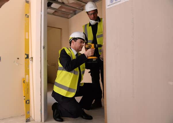 George Osborne visited a housing development before unveiling measures to encourage new homes