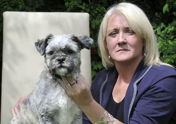 Jane Chippendale of Harehills, Leeds,with her pet dog Maxi