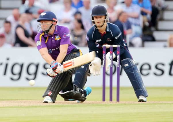 Yorkshire's Jonny Bairstow reverse sweeps during his innings against Northamptonshire.