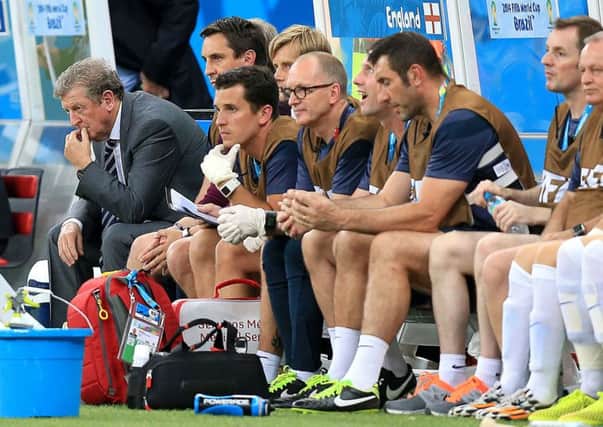 England manager Roy Hodgson, far left, sits in the dugout during Saturday's encounter with Italy.