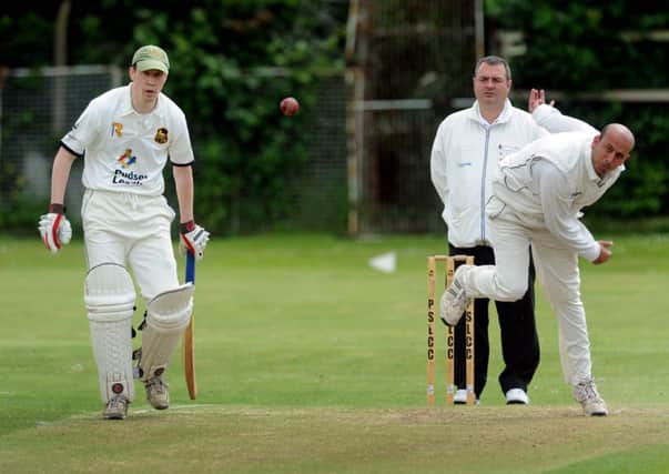 Great Horton's Jamil Akhtar bowls against Pudsey St Lawrence in Division Two of the Bradford League on Saturday. Picture: James Hardisty.