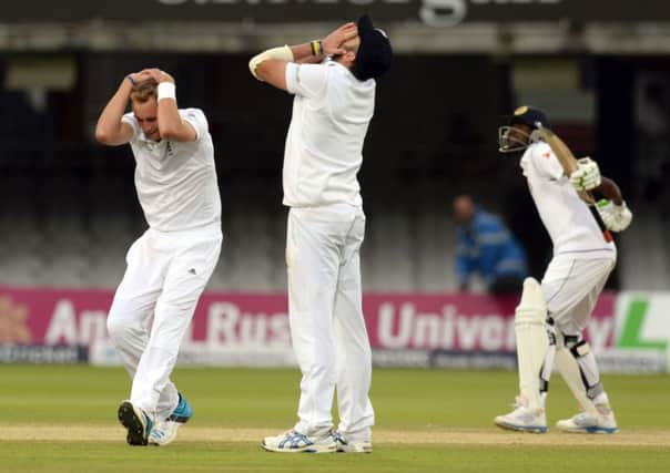 England's Stuart Broad and Liam Plunkett react as Sri Lanka draw the match during day five of the Test match at Lord's.