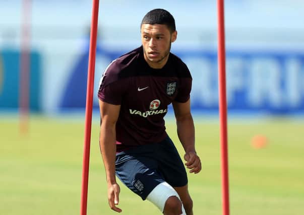 England Alex Oxlade-Chamberlain during a training session on Monday.