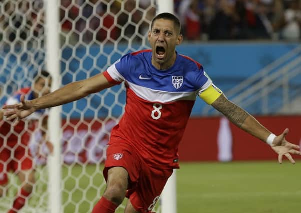 Clint Dempsey celebrates after scoring against Ghana.