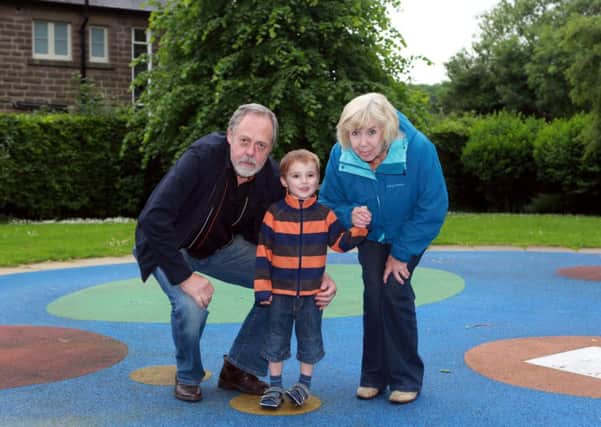 Anne Barrett, 76, and partner Stuart Delk with grandson Isaac, 4, at Bakewell recreation ground. Picture: Ross Parry Agency