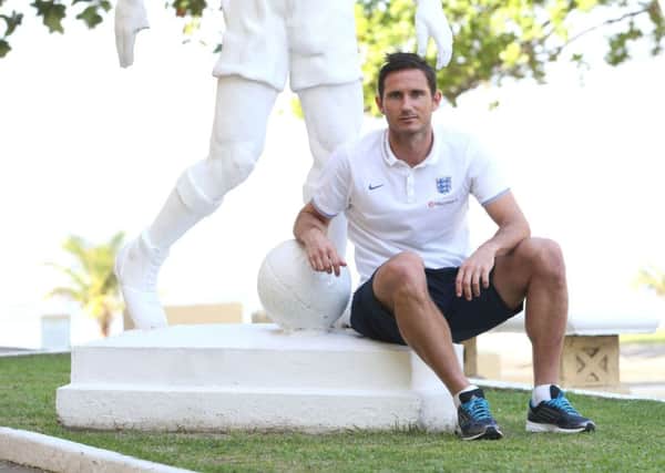 Frank Lampard, pictured yesterday at the Urca Military Training Ground, in Rio de Janeiro, feels sure Wayne Rooney will react to the criticism which has come his way in the best way possible  on the pitch in Englands crucial game with Urugua (Picture: Mike Egerton/PA).