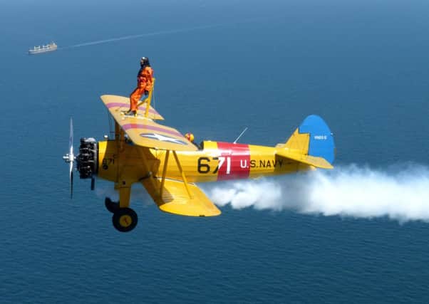 Nigel Hague, 85, completing his wing walk for charity. Picture: Ross Parry Agency
