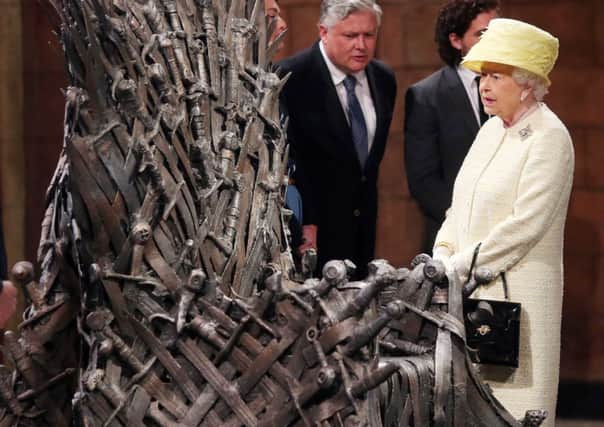 The Queen during a visit to the set of Game of Thrones on day two of a visit to Northern Ireland.
