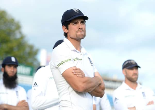England captain Alastair Cook watches the presentation at Headingley after Sri Lanka win the test series.