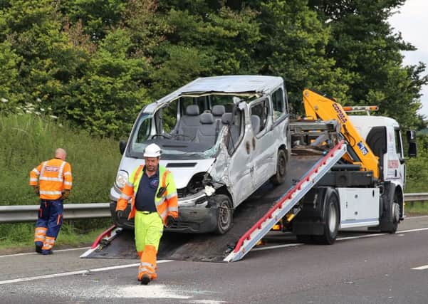 Six children escaped uninjured from the wreckage of this minibus. Picture: Ross Parry Agency
