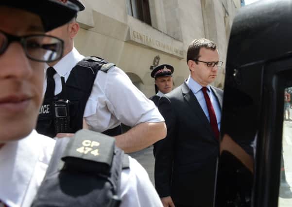 Former News of the World editor Andy Coulson leaves the Old Bailey in London