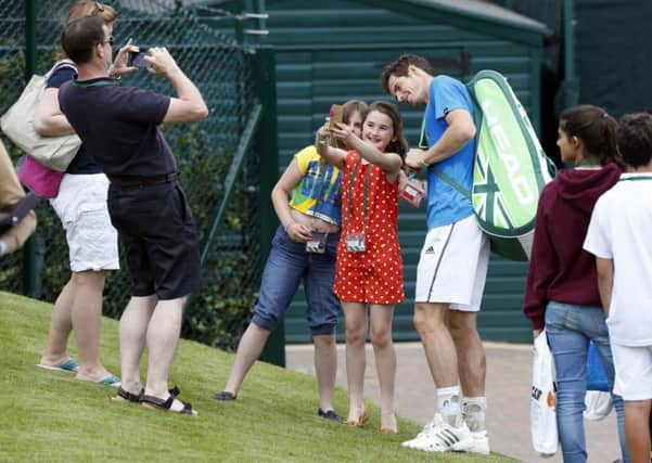 Andy Murray (right) poses for a selfie style photo with his cousins Cora (left) and Ailsa (centre) Erskine.