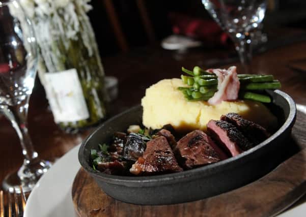 Onglet with bacon, mushrooms, garlic mash. Picture by Bruce Rollinson