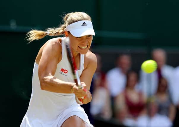 Germany's Angelique Kerber in action against Russia's Maria Sharapova.