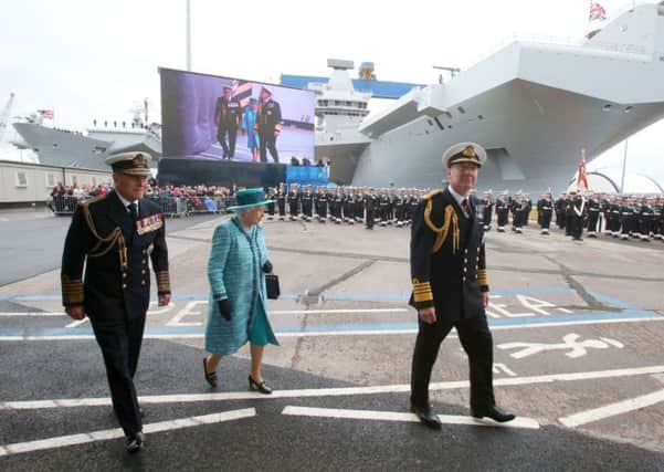 The Queen and Duke of Edinbugh arrive at HMS Queen Elizabeth in Rosyth Dockyard, Fife